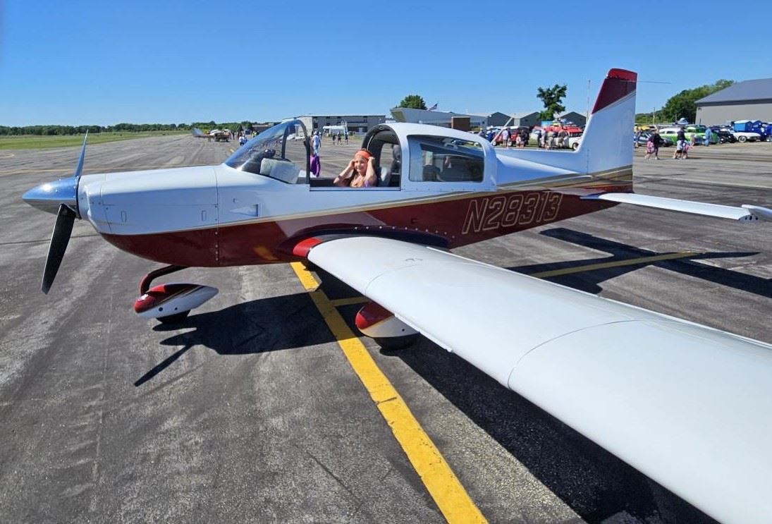 Girl in Sandberg Plane