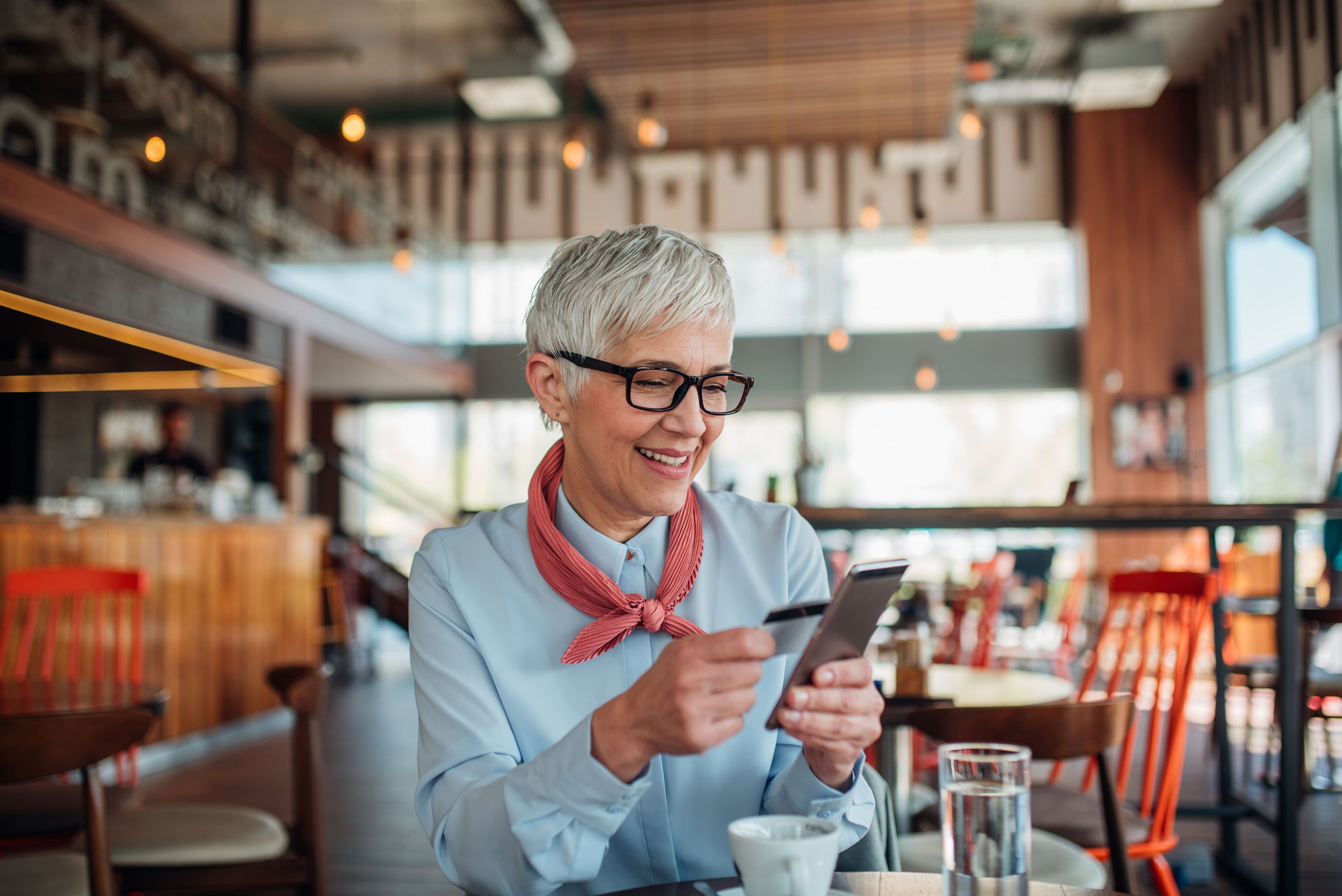 Woman Making Mobile Payment
